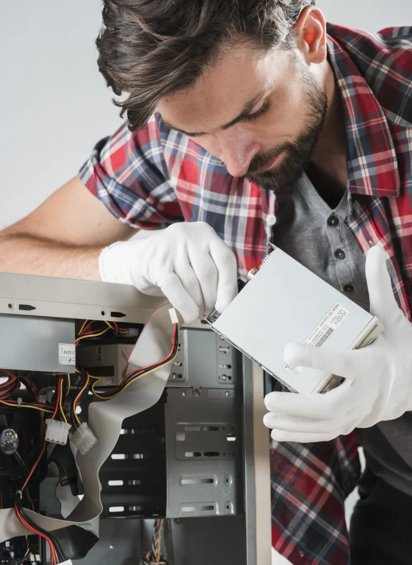 technician-inserting-sata-data-cable-hard-disk-drive